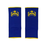 Top King blue ankle guards with yellow logo, front view
