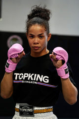 Dione Barbosa wearing top king pink MMA gloves, Top king t-shirt, Top King Muay Thai shorts