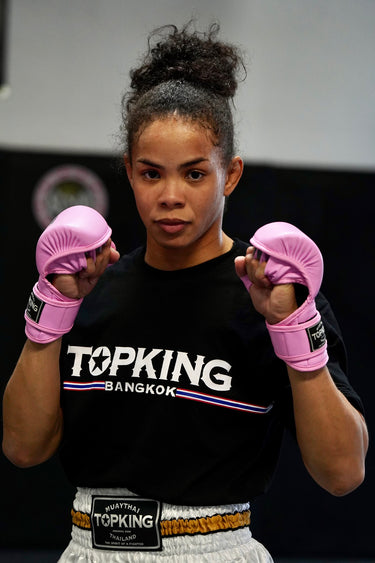Dione Barbosa wearing top king pink MMA gloves, Top king t-shirt, Top King Muay Thai shorts