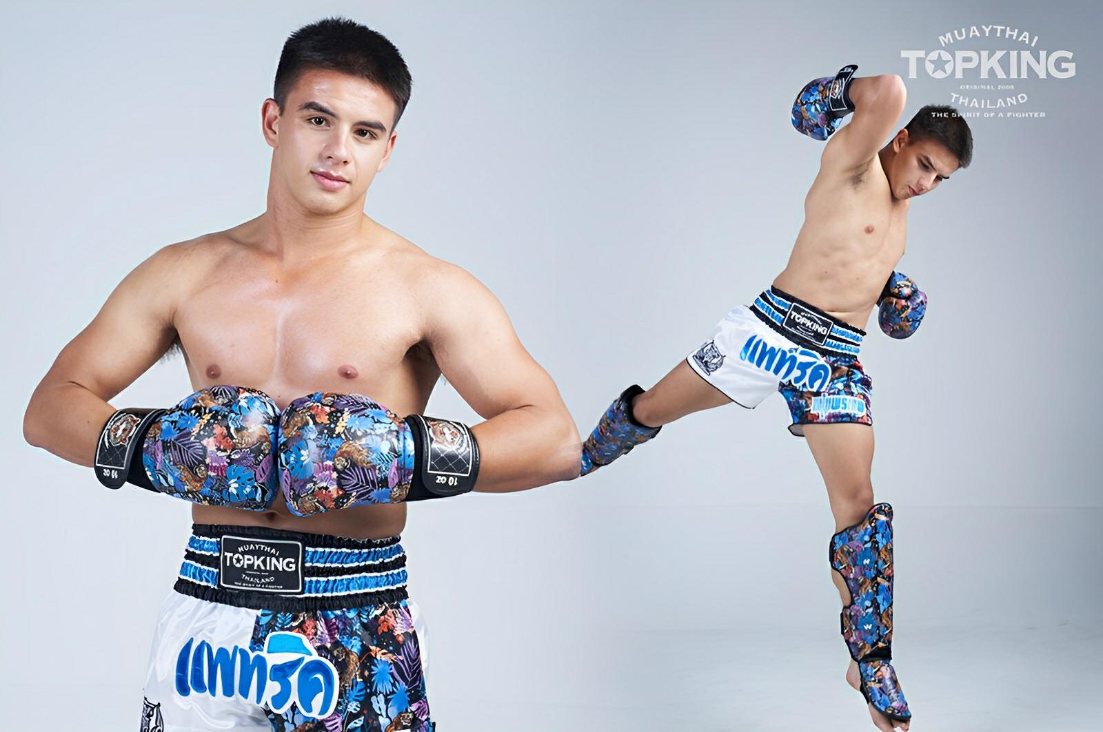 Muay Thai fighter jumping elbow wearing top king boxing gear