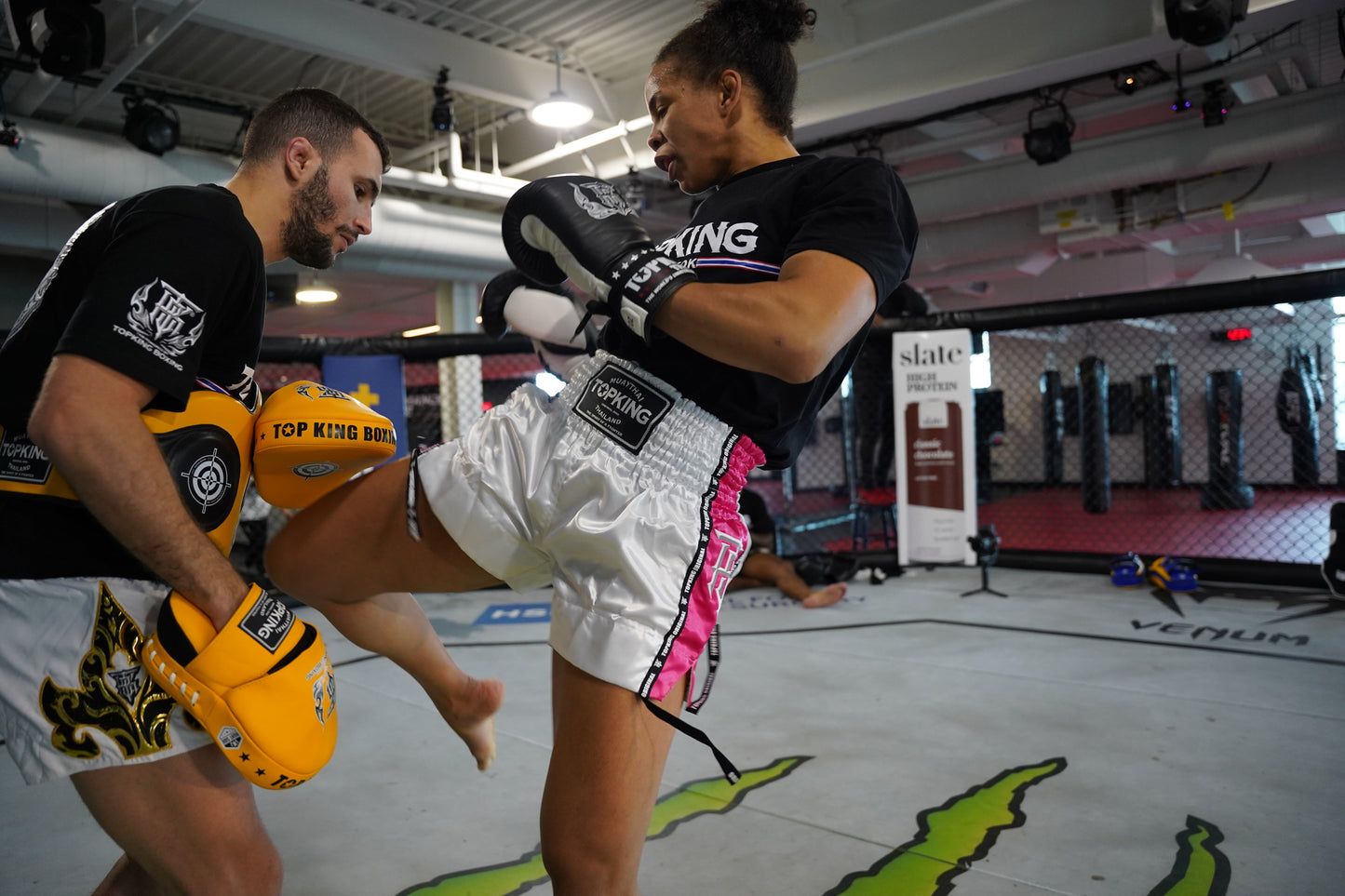 UFC fighter and trainer wearing Top King USA Gear