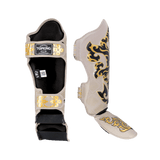 Top King shin guards; Kanok beige used for Muay Thai and mma sparring 