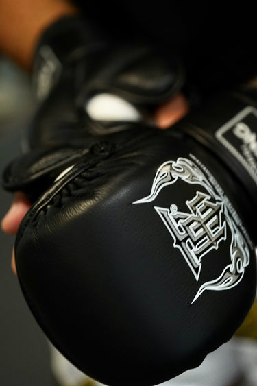 Top King Black Sparring MMA gloves - close up showing Top King logo