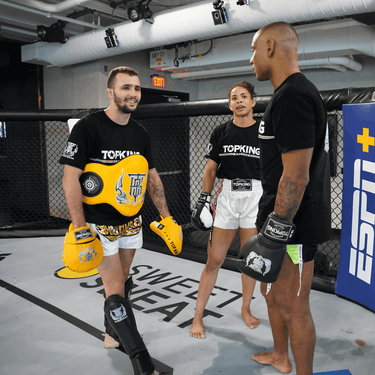 Top King sponsored fighters, Dione Barbosa and Cesar Almeida with their Top King trainer Matheus Naccache